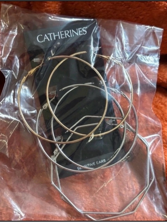 Catherine’s & Amazon Garoff Collection Jewelry - Catherine's large hoop earrings; Lariat necklace with drop faux pearl.